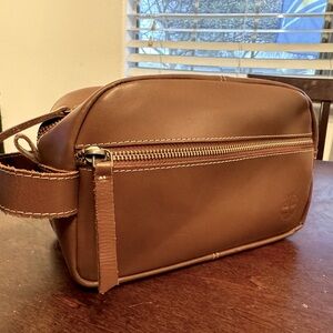 Cognac colored timberland toiletry bag